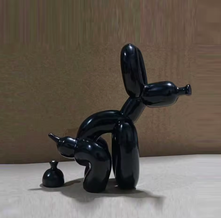 Lumiere black dog statue