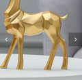 Lumiere golden animal statue